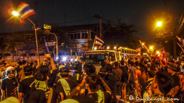 Tension between bangkok protesters and riot police